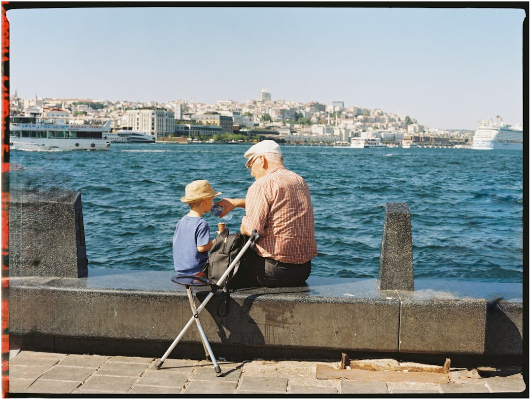 photographer interviewing elderly