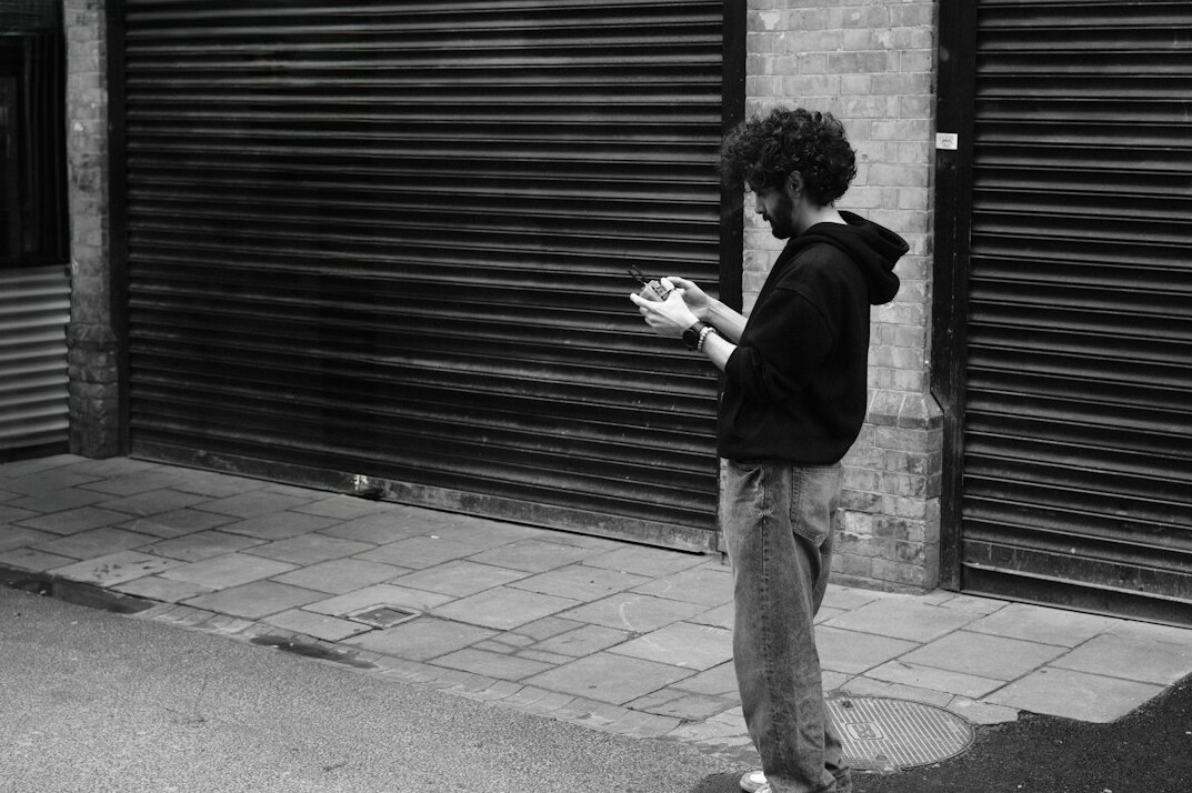 photographer capturing street moment