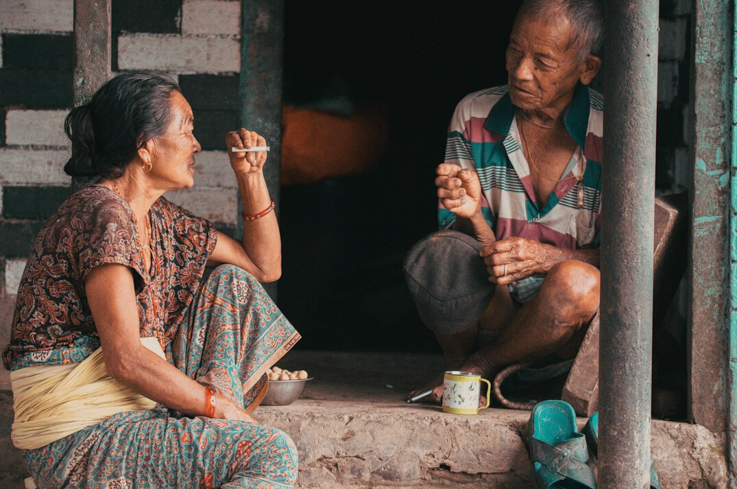 elderly women sharing stories