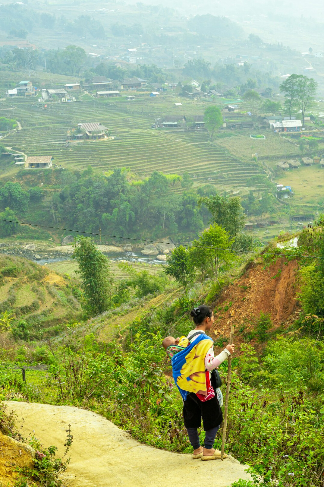 young person returning to village